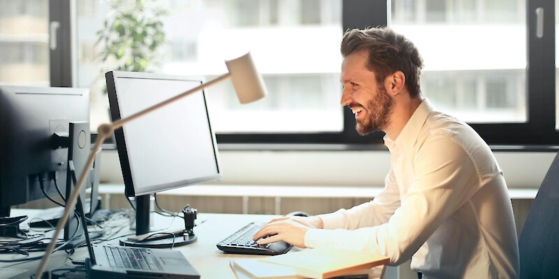 Man sat at computer